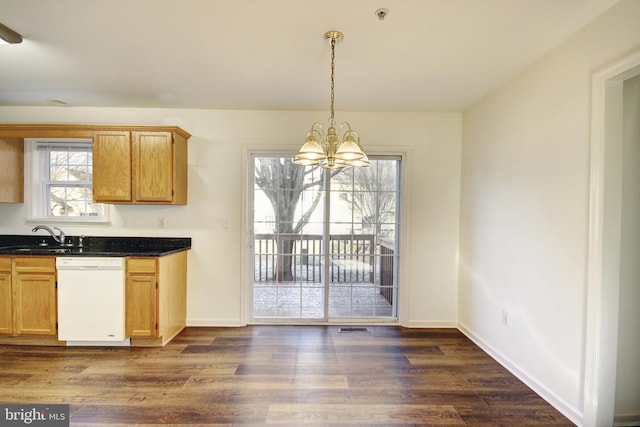 kitchen featuring pendant lighting, dishwasher, dark wood-type flooring, an inviting chandelier, and sink