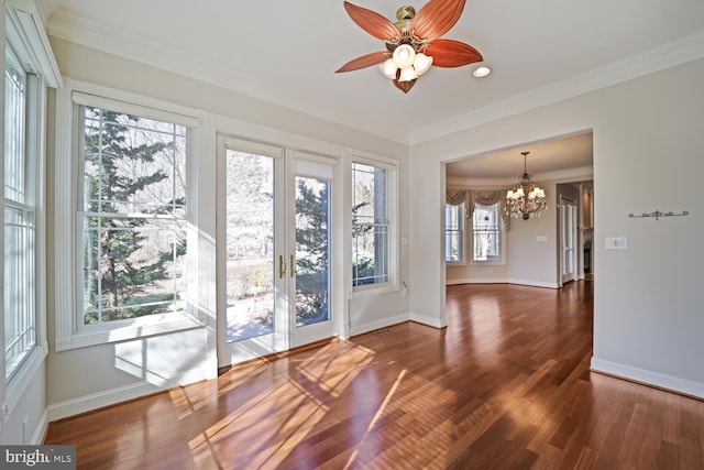 interior space featuring dark wood-style floors, baseboards, crown molding, and french doors