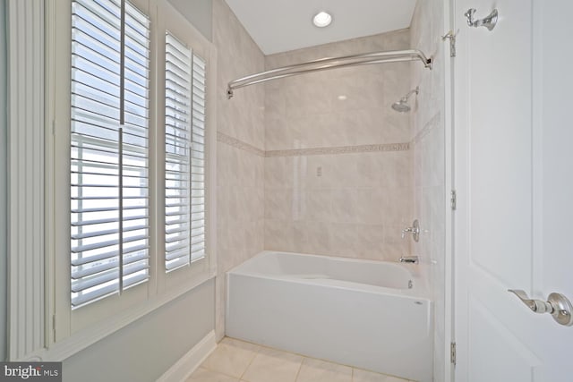 full bath featuring tile patterned flooring and shower / washtub combination