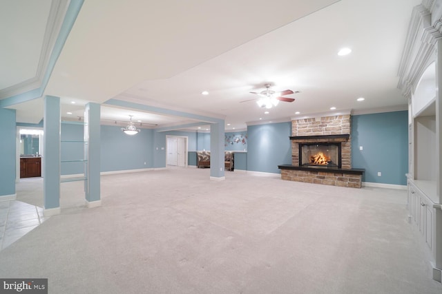 interior space featuring light carpet, a fireplace, and crown molding