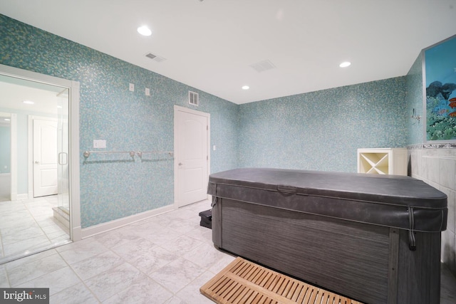 bedroom with recessed lighting, visible vents, baseboards, and wallpapered walls