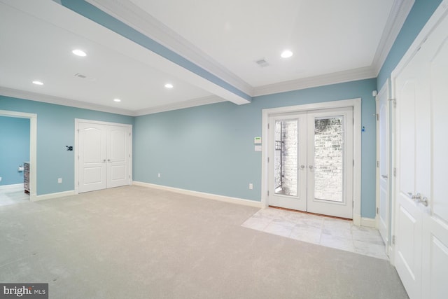 entrance foyer featuring ornamental molding, french doors, light carpet, and baseboards