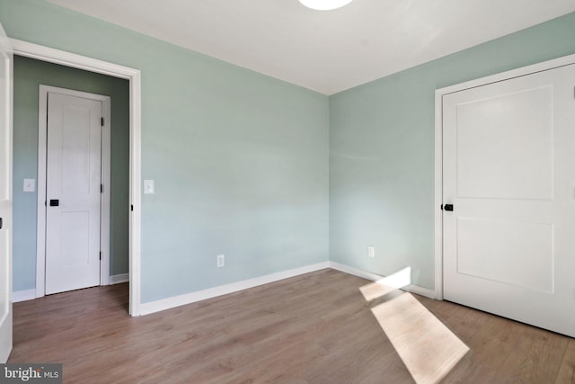 empty room with light wood-type flooring