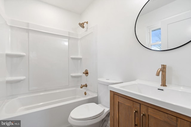 full bathroom with washtub / shower combination, vanity, and toilet