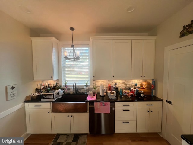 kitchen with white cabinets, dishwasher, sink, and hanging light fixtures