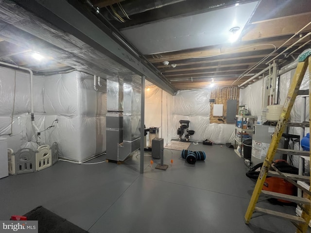 basement featuring water heater