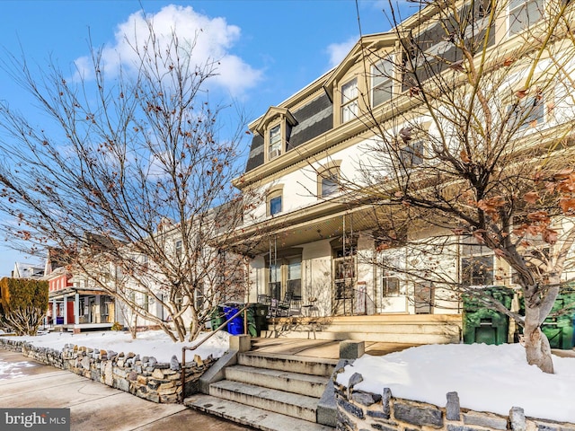 view of snow covered property