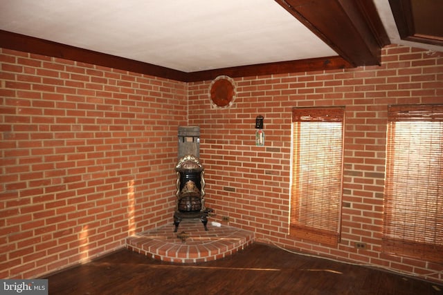 details with beamed ceiling and hardwood / wood-style flooring