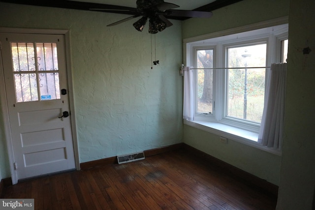 interior space with ceiling fan and a wealth of natural light