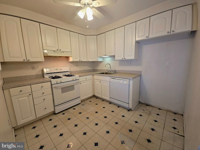 kitchen with ceiling fan, sink, white cabinets, and white appliances