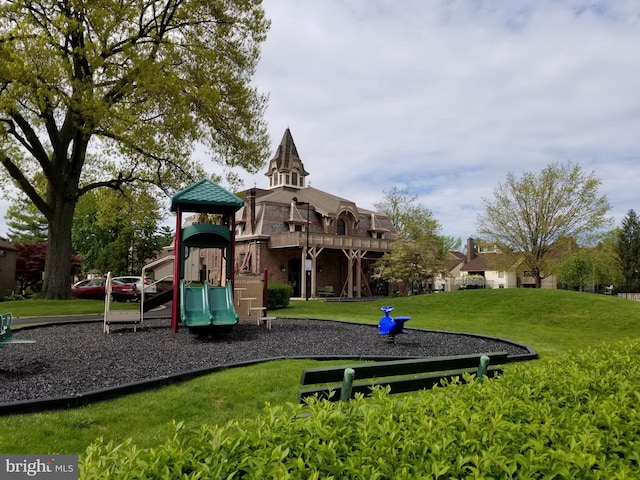 view of jungle gym with a yard