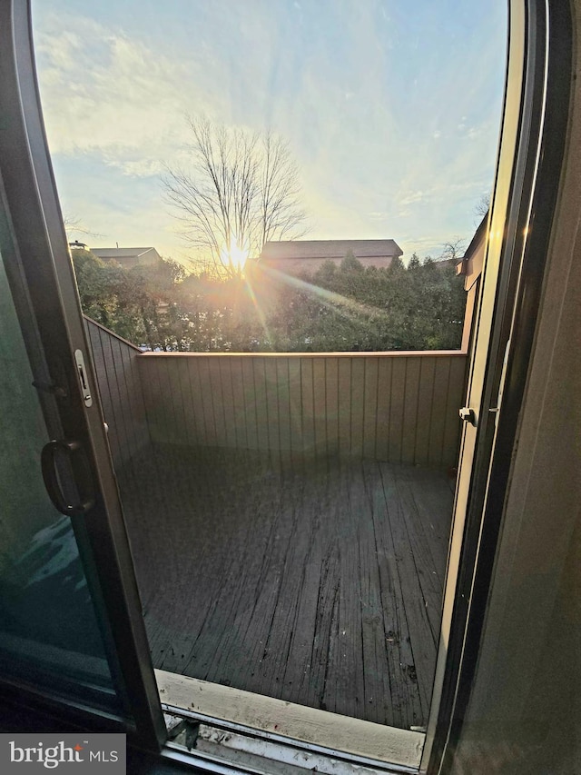 view of balcony at dusk