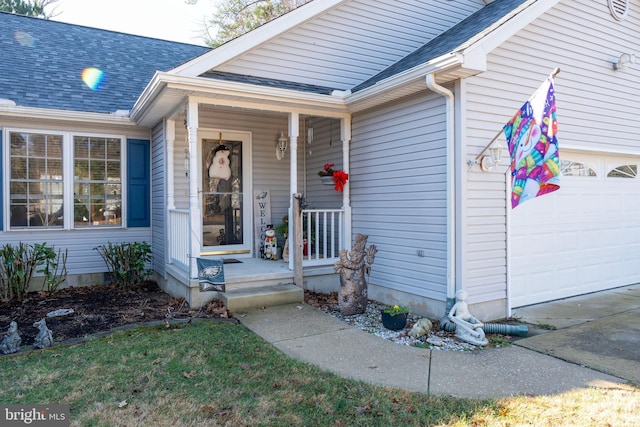 entrance to property featuring a garage