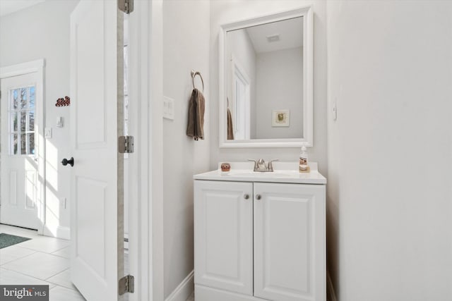 bathroom with vanity and tile patterned floors