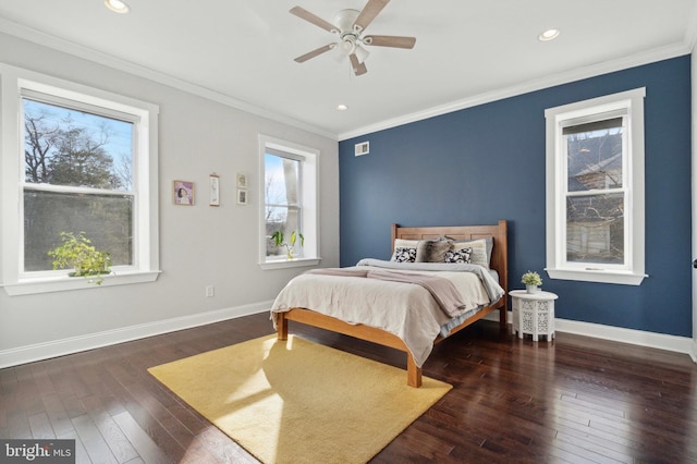 bedroom featuring multiple windows, ceiling fan, crown molding, and dark hardwood / wood-style floors