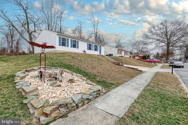 view of front of property with a front yard