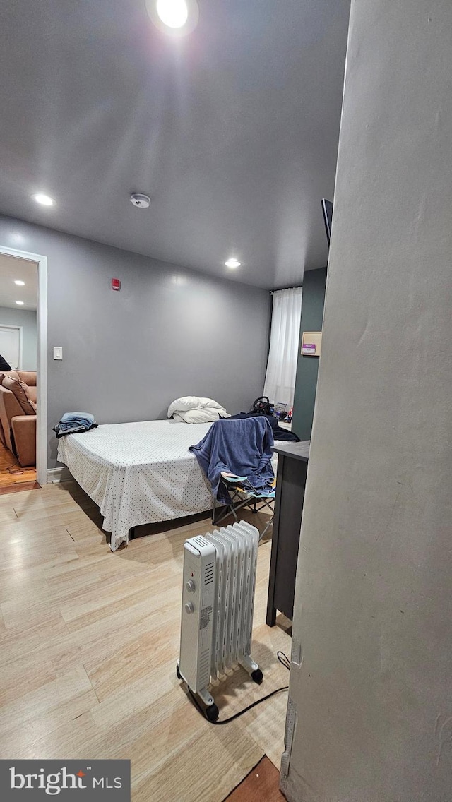 bedroom featuring light wood-type flooring