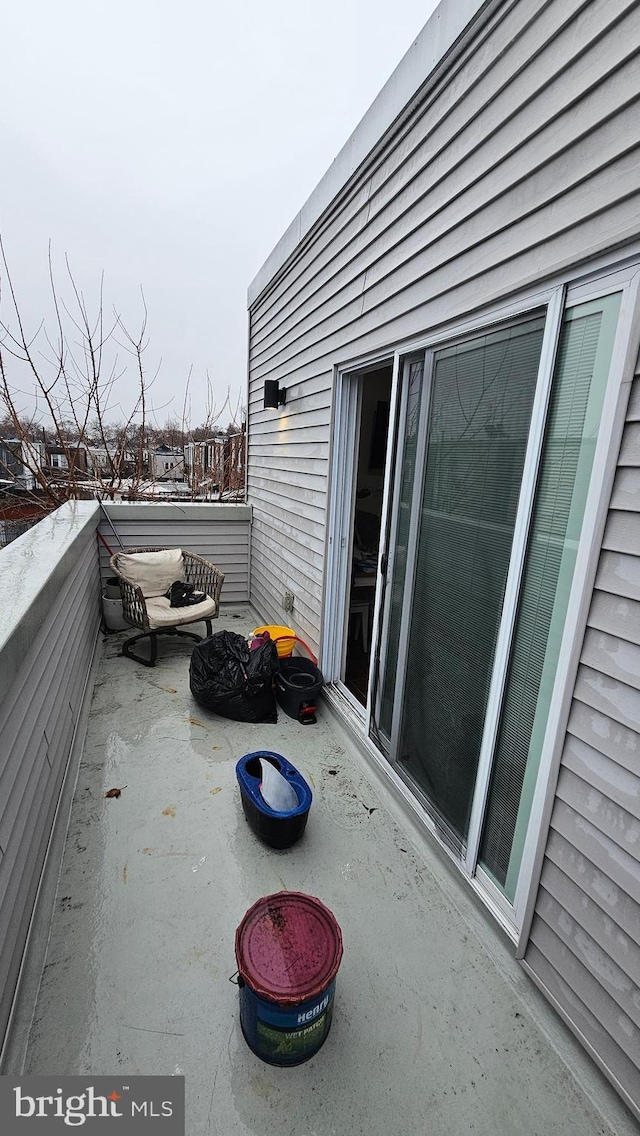 view of patio / terrace with a balcony