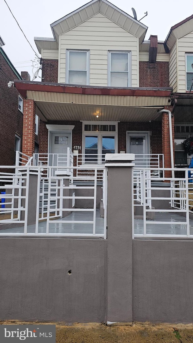 view of front facade featuring covered porch