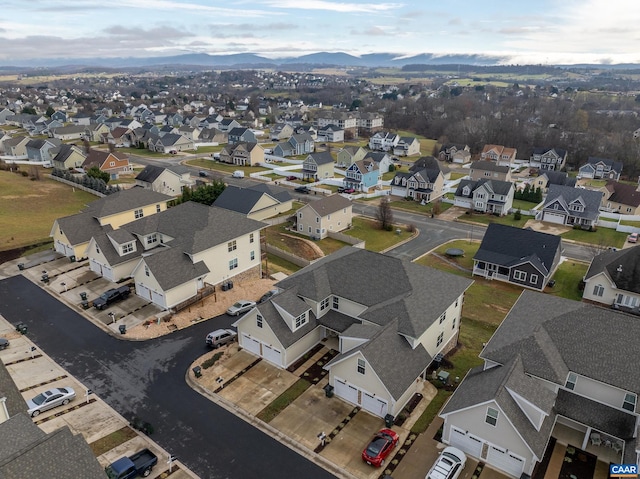 drone / aerial view featuring a mountain view