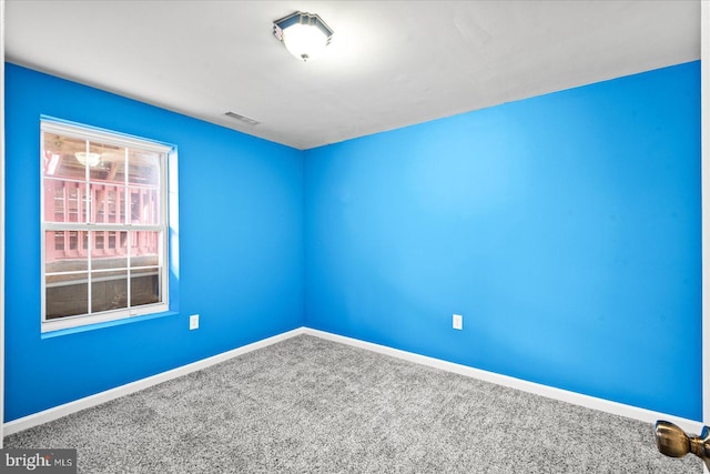 empty room with carpet floors