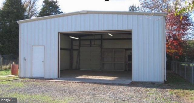 view of outdoor structure featuring a garage