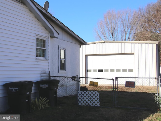 view of side of property with a garage