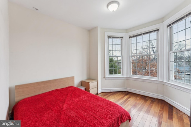 bedroom featuring hardwood / wood-style flooring