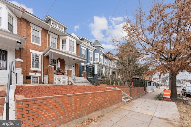 multi unit property featuring covered porch