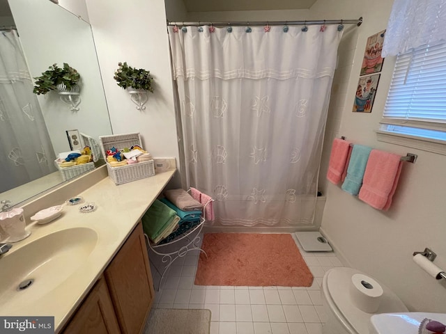 full bathroom featuring toilet, vanity, shower / bath combination with curtain, and tile patterned floors