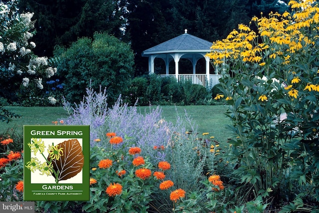 exterior space with a gazebo and a yard