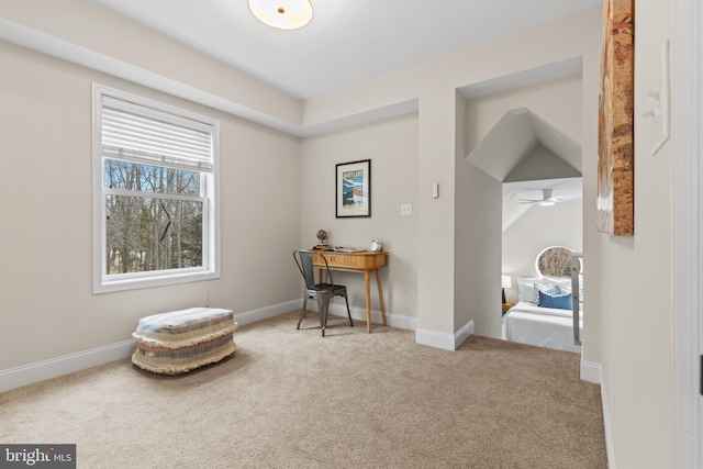 sitting room with carpet floors and baseboards