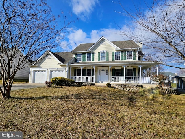 view of front facade featuring a garage, a porch, and a front lawn