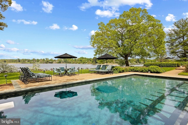 pool with a patio area