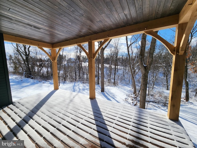 view of snow covered deck