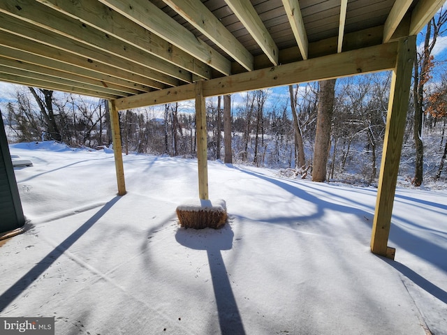 view of snow covered patio