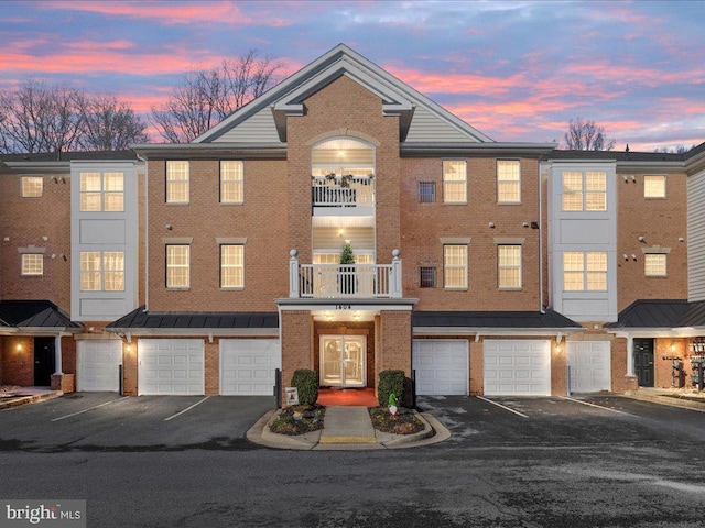 multi unit property featuring a balcony