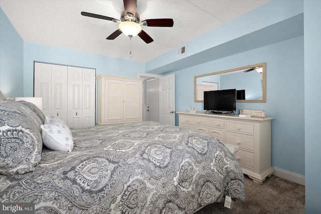 bedroom with ceiling fan and carpet