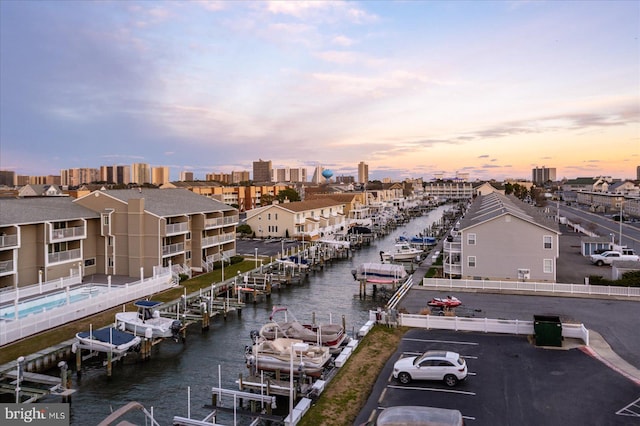 aerial view at dusk with a water view