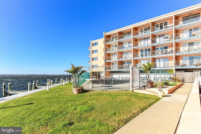 view of property with a water view