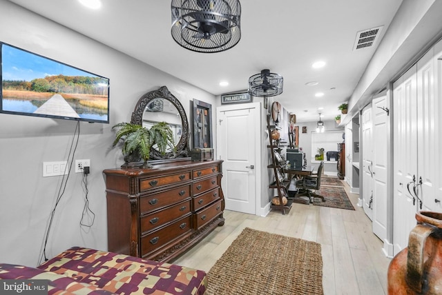 bedroom featuring light hardwood / wood-style floors