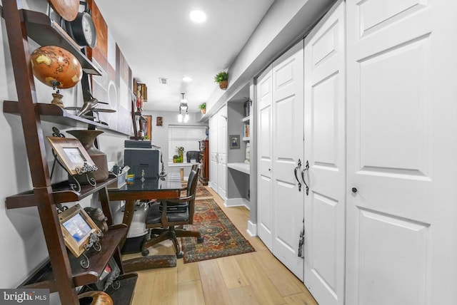 office featuring light hardwood / wood-style floors