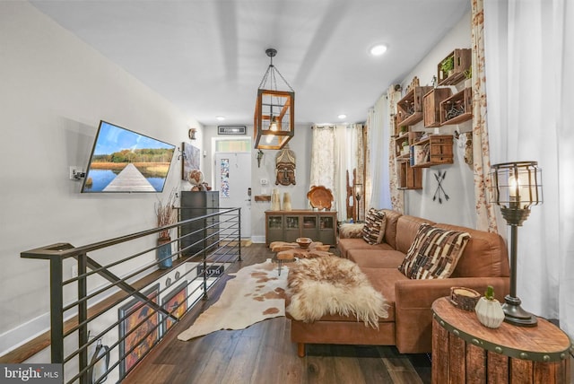 living area featuring dark wood-type flooring