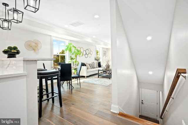 corridor featuring hardwood / wood-style floors