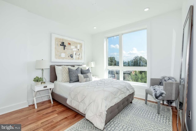 bedroom featuring light wood-type flooring