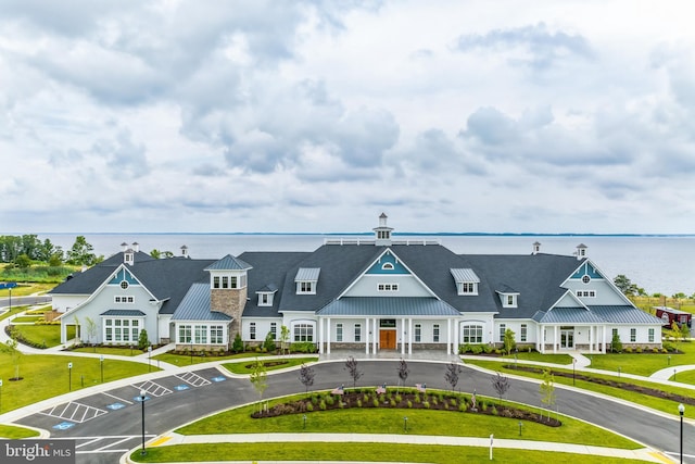 view of building exterior with a water view