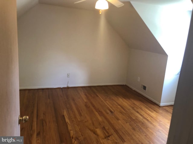 bonus room with ceiling fan, hardwood / wood-style floors, and lofted ceiling