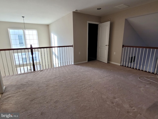 empty room featuring carpet flooring