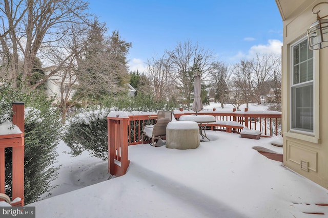 view of snow covered deck