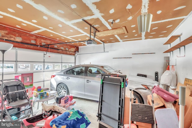 garage featuring a garage door opener